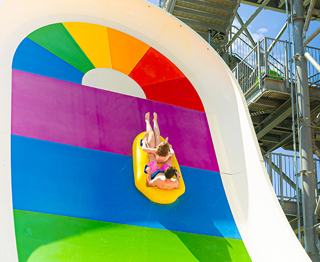 Guests on a water slide at the Massanutten Outdoor WaterPark