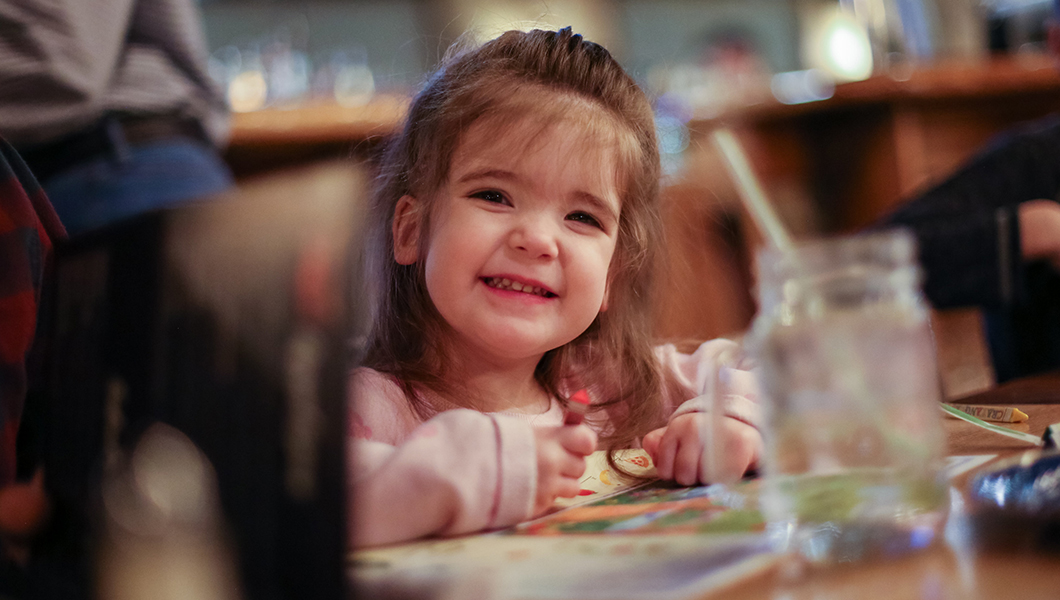 A girl dining at Massanuten Resort