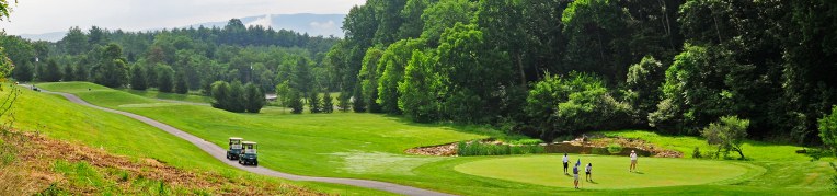 Guests playing golf at Woodstone Meadows Golf Course at Massanutten Resort