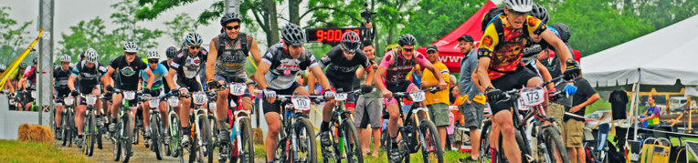 People riding in a bike race on the Massanutten Western Slope