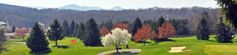 A scenic view of the Woodstone Meadows Golf Course in the spring at Massanutten Resort