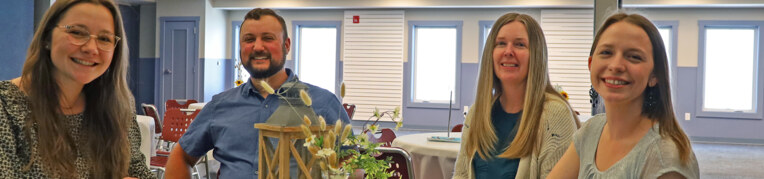 A group sitting around a fire