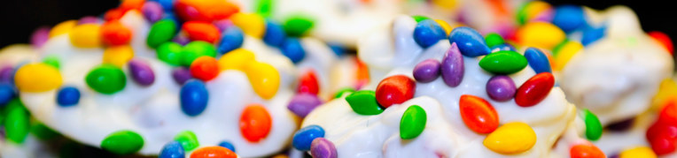 Close up of cupcakes with candies on top