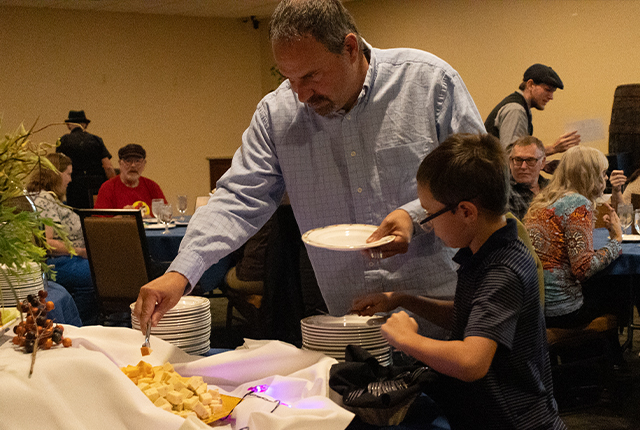 Guests enjoying food at a dining event