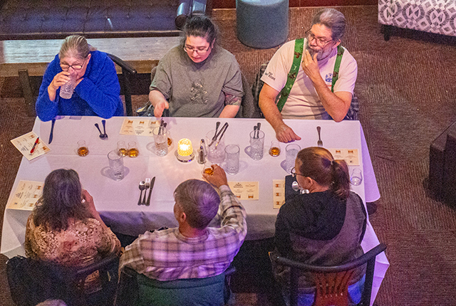 A group enjoying our Whiskey Social event