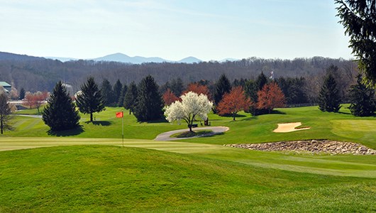 A scenic photo of the Woodstone Meadows Golf Course at Massanutten Resort