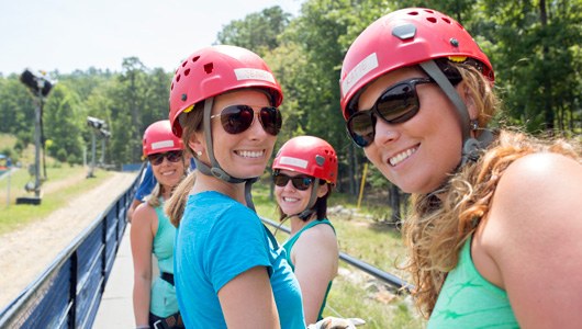 A group of ziplining at Massanutten Resort